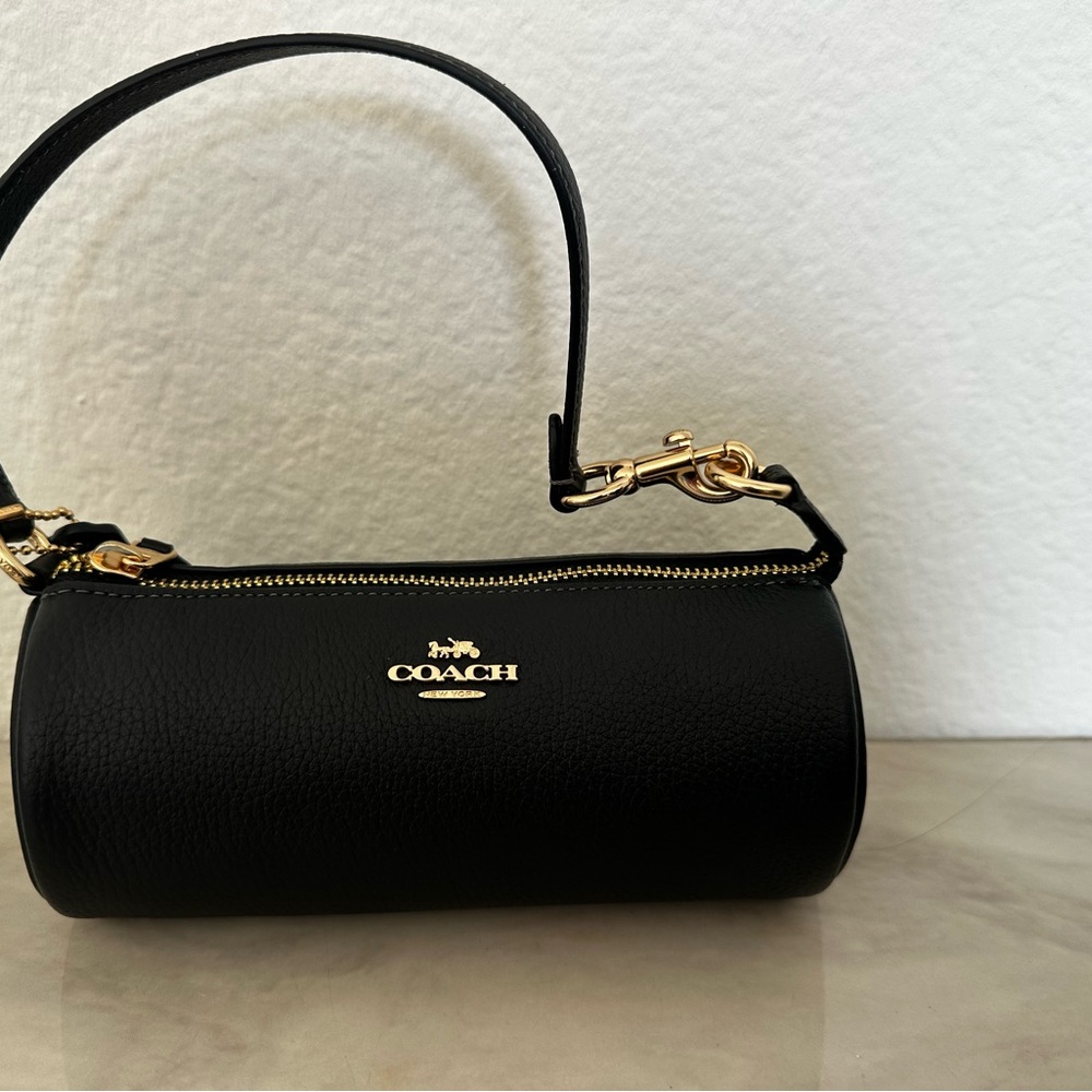 Coach Black Mini Cylinder Bag with Gold Accents
